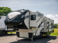 2014 GRAND DESIGN MOMENTUM 385TH exterior front driver side