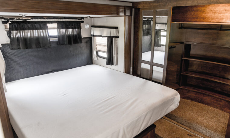 2014 GRAND DESIGN MOMENTUM 385TH interior primary bedroom