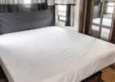 2014 GRAND DESIGN MOMENTUM 385TH interior primary bedroom