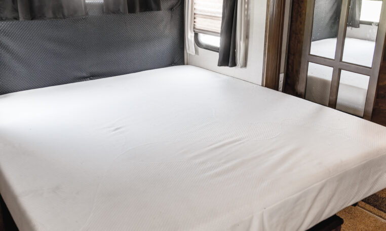 2014 GRAND DESIGN MOMENTUM 385TH interior primary bedroom