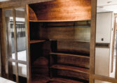2014 GRAND DESIGN MOMENTUM 385TH interior primary bedroom