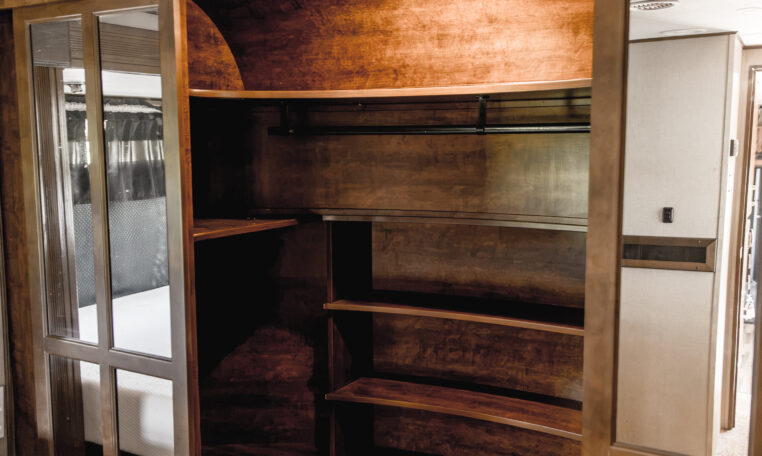 2014 GRAND DESIGN MOMENTUM 385TH interior primary bedroom