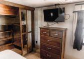 2014 GRAND DESIGN MOMENTUM 385TH interior primary bedroom
