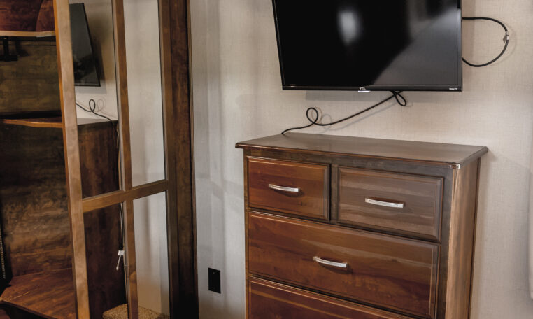 2014 GRAND DESIGN MOMENTUM 385TH interior primary bedroom