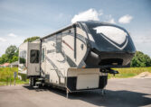 2014 GRAND DESIGN MOMENTUM 385TH exterior front passenger side
