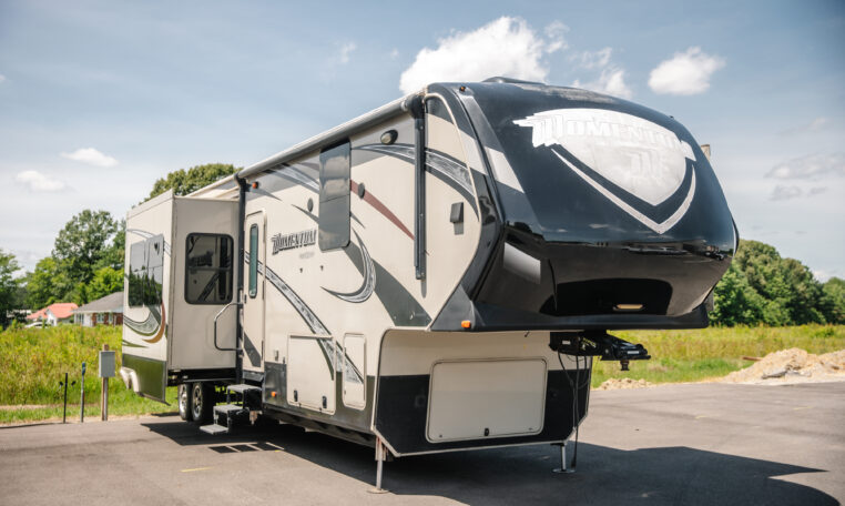 2014 GRAND DESIGN MOMENTUM 385TH exterior front passenger side