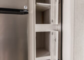 Palomino Puma 25RKQB Travel Trailer interior rear kitchen
