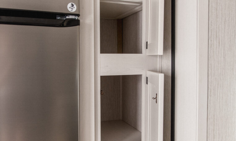 Palomino Puma 25RKQB Travel Trailer interior rear kitchen
