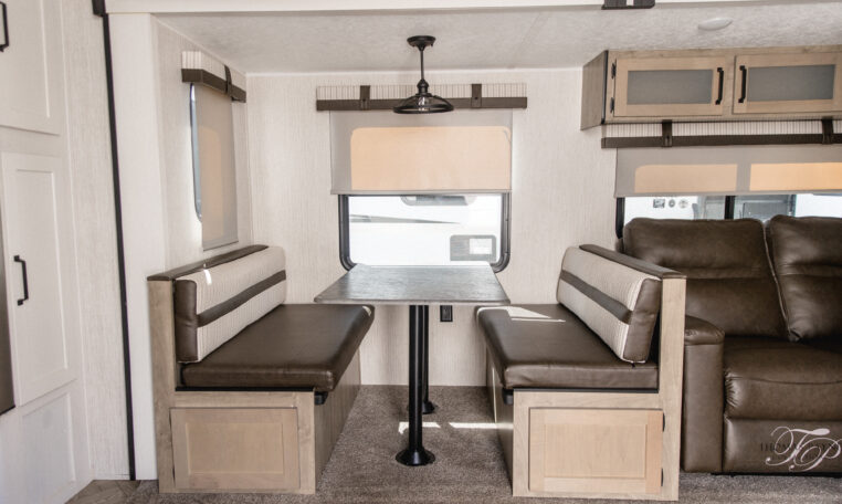 Palomino Puma 25RKQB Travel Trailer interior dining banquet