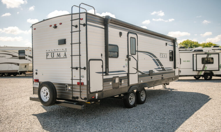 Palomino Puma 25RKQB Travel Trailer exterior rear passenger side