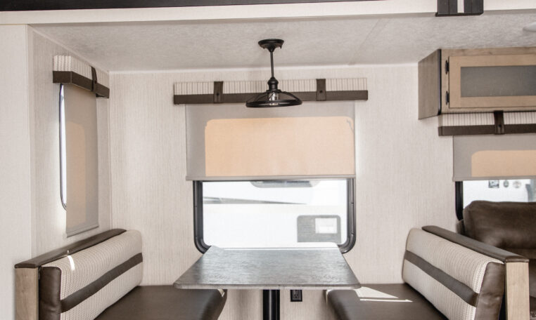 Palomino Puma 25RKQB Travel Trailer interior dining banquet
