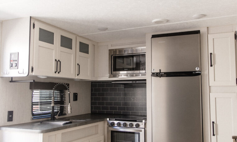 Palomino Puma 25RKQB Travel Trailer interior rear kitchen