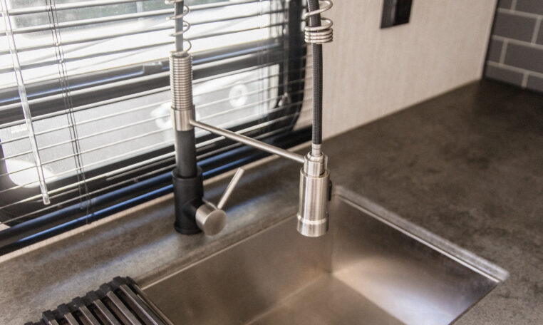 Palomino Puma 25RKQB Travel Trailer interior rear kitchen