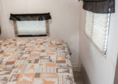 2018 CrossRoads Sunset Trail SS210FK interior bedroom